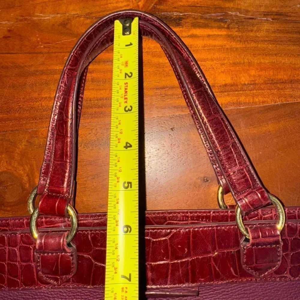 Issac Mizrahi leather handbag with large faux croc pocket.   Magnetic closure